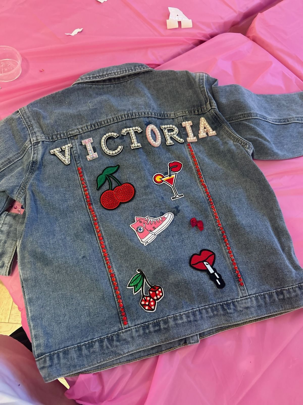 A personalised denim jacket decorated with patches