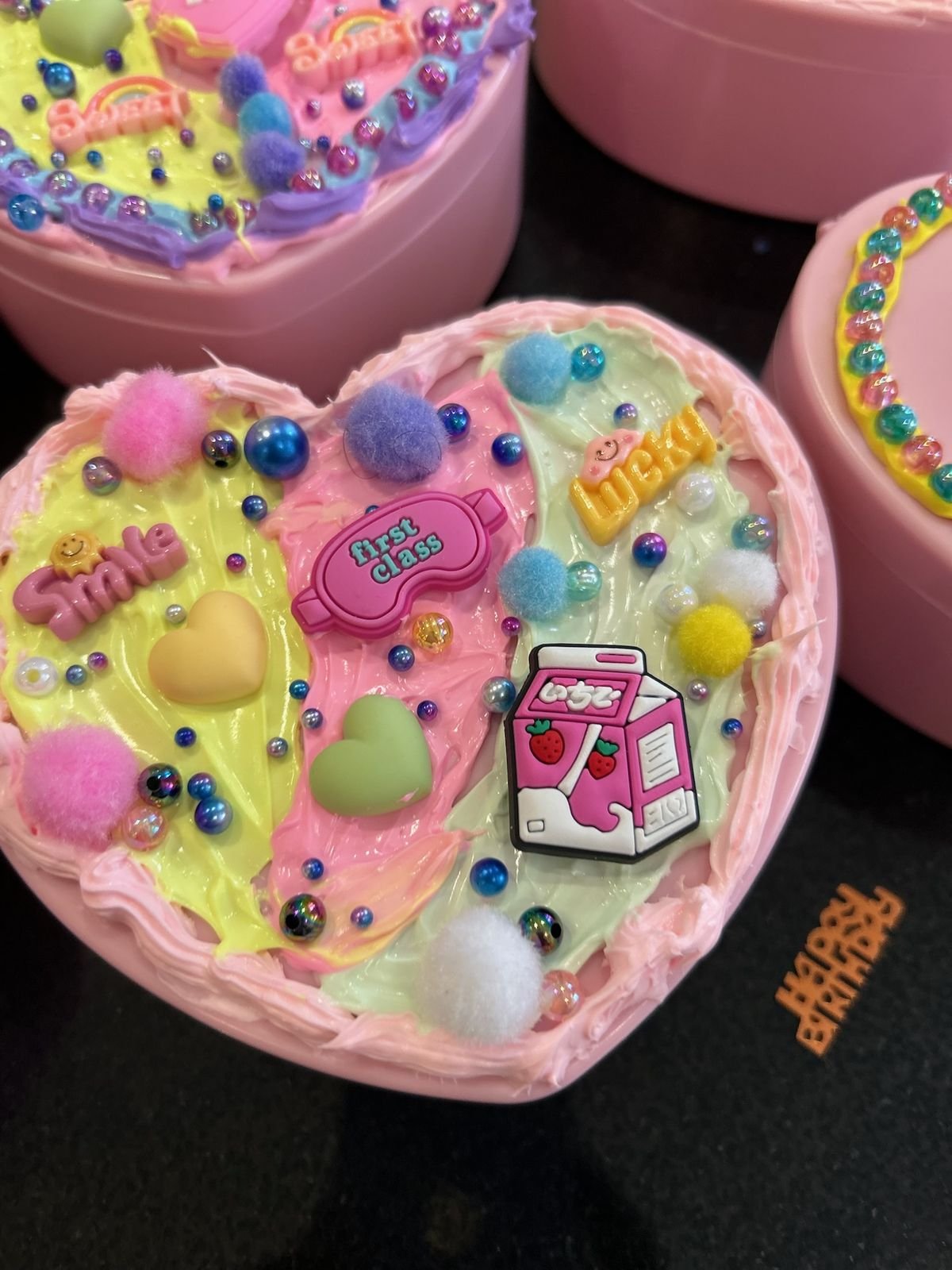 Pastel heart-shaped slime creations made at a Jazzy Slime party