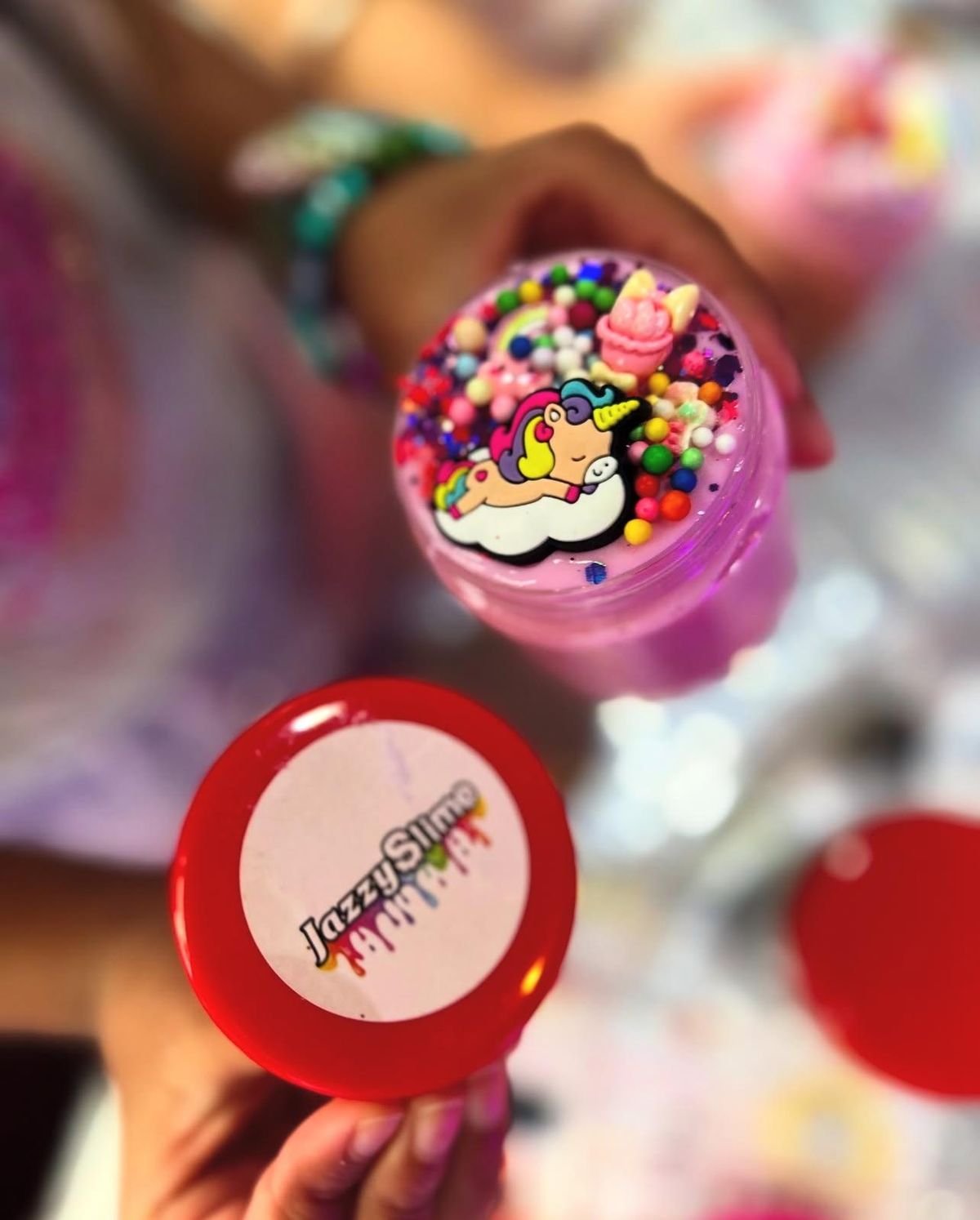 A Jazzy Slime pot with a unicorn-themed lid
